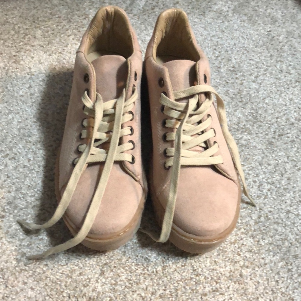 woman’s pink suede Steve Madden shoes